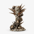A decorative seashell candle holder featuring a cluster of natural spiral shells arranged on a round base, photographed against a plain white studio background.