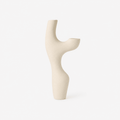 White abstract vase on a white background
