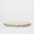 Ruffle Oval Platter_Nathalee Paolinelli_201-72-2064-137BLKRINGOS | Obakki