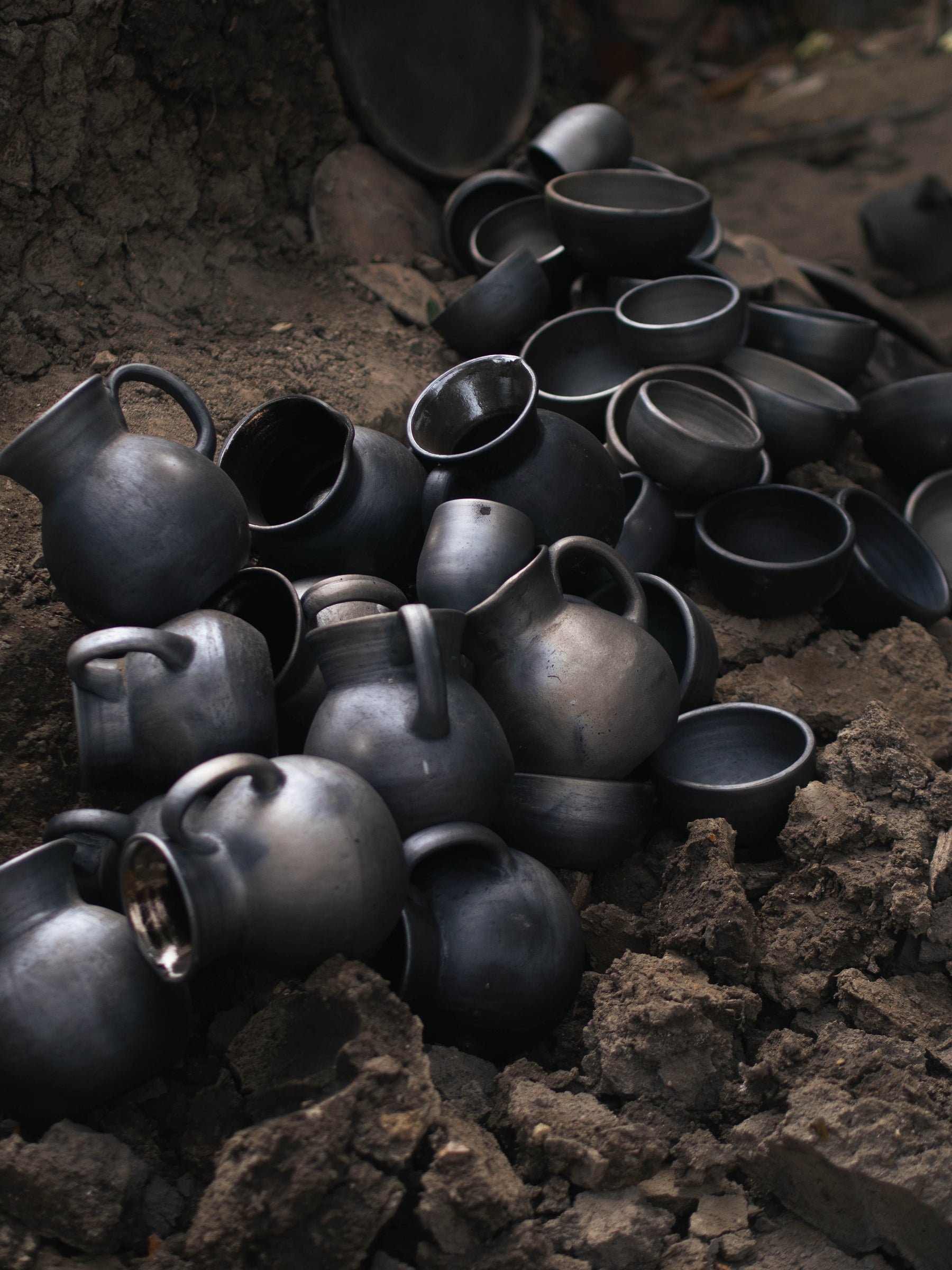 black clay pottery in oaxaca made by rufina on the ground