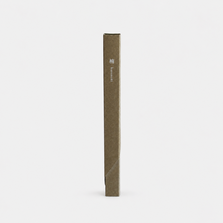 A tall, slender rectangular box in a muted olive-brown color, standing vertically against a clean white background. The box features a small white printed kusunoki brand name near the top.