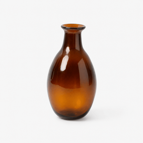 Brown glass vase on a white background